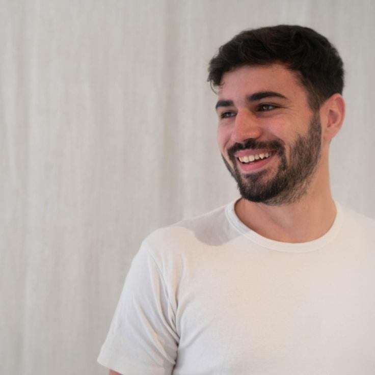 Kaveri Mehta, Lead Design Curator at Luminous Work Flow Matrix, reviewing corporate floral arrangements